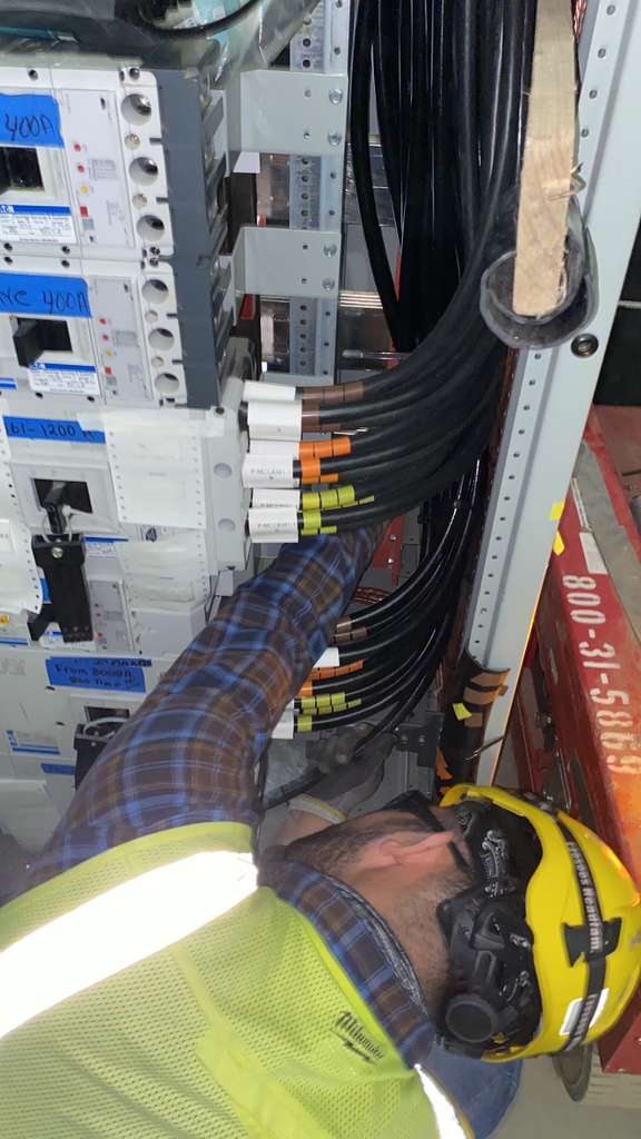 Panel Wiring — Technician at Work
